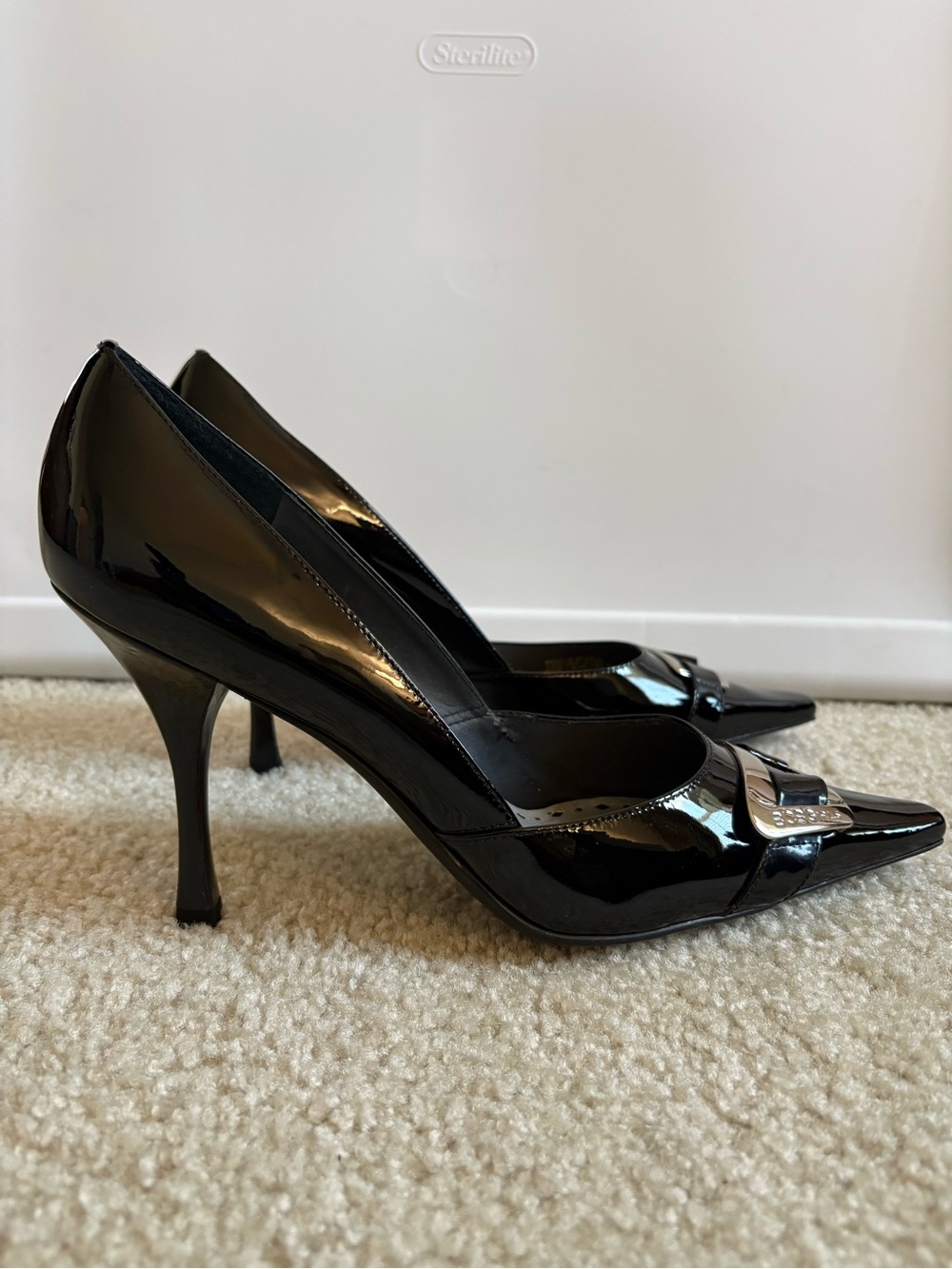 BCBGirls Black Patent Pointed-Toe Heels with Buckle Detail